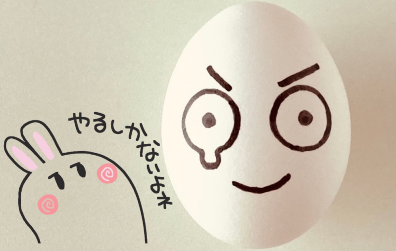 泣いている表情の卵とそれを見るウサギのイラスト